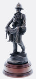 firefighter in the 80s carrying an unconscious victim from a burning building in a similar pose to that of the 'Saved' firefighter of Victorian Era painted by Charles Vigour which is displayed in the Fire Service Technical College at Moreton-in-Marsh
