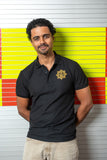shirt comes in black with a gold star