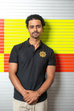 shirt comes in black with a gold star