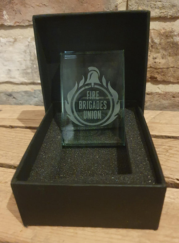jade coloured glass and is engraved with the FBU Logo
