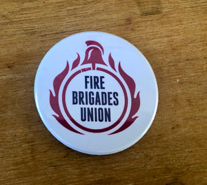 The FBU badge is on the front with a bottle opener clasp at the rear and a magnet