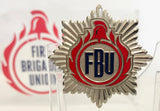 Die-stamped FBU crest, cut to shape at about 45mm size and produced from solid copper alloy material in a combination of flat and relief metal styles. Within the design there are 2 colour enamels . Reverse fixings are hard soldered 2qty shanked jump rings with cotter pin. The front of each badge is hand polished and chrome electroplated all over.