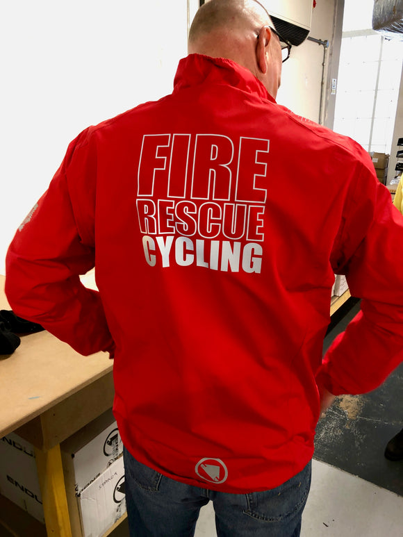 The jacket has the FBU badge printed on the right breast and 'Fire Rescue Cycling' on the back.