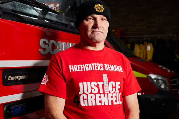Elasticated woolly beanie hat in black sporting the gold FBU logo in the Fire Service Star stitched on the front
