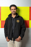 fleece featuring the FBU logo within the Fire Service eight pointed star, a design developed to celebrate the centenary of the Fire Brigades Union.  Fleece comes in black with a gold star.