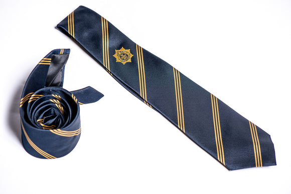 Navy, with gold stripes and the gold FBU badge in the centre